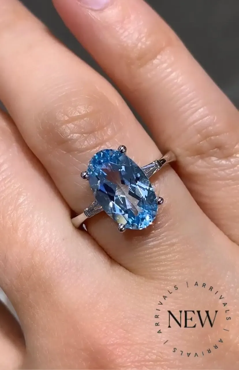 4.51ct Light Blue Topaz Elongated Oval with diamonds