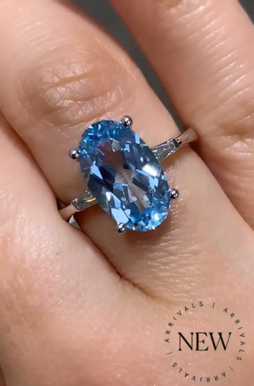 4.51ct Light Blue Topaz Elongated Oval with diamonds