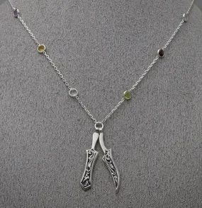 Khanda and Kirpan on faceted gemstone necklace