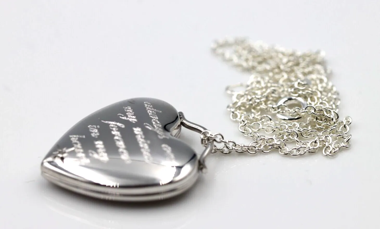 Sterling Silver Oval Diamond Engraved Heart Locket 2 pictures   Chain